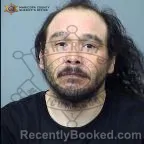 Mugshot of Frank Marcelo Romero booked in Maricopa County, Arizona on October 6, 2026