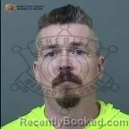 Mugshot of Travis Brewer booked in Maricopa County, Arizona on October 6, 2026