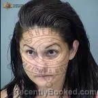 Mugshot of Delberta Flores booked in Maricopa County, Arizona on October 7, 2026