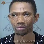 Mugshot of Alain Muhoza booked in Maricopa County, Arizona on October 8, 2026