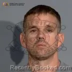 Mugshot of Alex Harrison booked in Maricopa County, Arizona on October 10, 2026