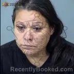 Mugshot of Kathleen Gabrielle Abrigo booked in Maricopa County, Arizona on October 12, 2026