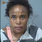 Mugshot of Anne-Christelle Almonnord booked in Maricopa County, Arizona on October 12, 2026