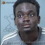 Mugshot of Komla David Alla booked in Maricopa County, Arizona on October 13, 2026