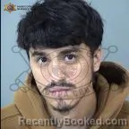 Mugshot of David Andrew Loera-Martinez booked in Maricopa County, Arizona on October 13, 2026