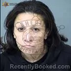 Mugshot of Elisa Vega booked in Maricopa County, Arizona on October 13, 2026