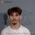 Mugshot of Andrew Olszewski booked in Maricopa County, Arizona on October 13, 2026