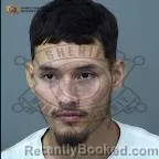 Mugshot of Isaac Gonzales Flores booked in Maricopa County, Arizona on October 13, 2026