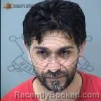 Mugshot of Johnny Flores Morales booked in Maricopa County, Arizona on October 14, 2026