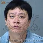 Mugshot of Rui Q Han booked in Maricopa County, Arizona on October 14, 2026