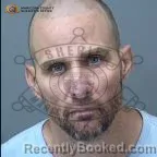 Mugshot of Brandon Mark Burtnett booked in Maricopa County, Arizona on October 15, 2026