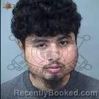 Mugshot of Christopher Juan Castillo Flores booked in Maricopa County, Arizona on October 18, 2026