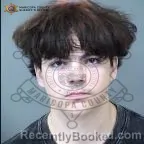 Mugshot of Conlan Magowan Schneider booked in Maricopa County, Arizona on October 18, 2026