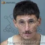 Mugshot of Carlos L Enriquez Urias booked in Maricopa County, Arizona on October 18, 2026