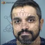 Mugshot of Navin Rajan booked in Maricopa County, Arizona on October 19, 2026