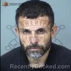 Mugshot of Aaron Elias Romero booked in Maricopa County, Arizona on October 21, 2026
