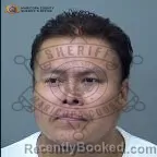 Mugshot of Dominique Corey John booked in Maricopa County, Arizona on October 24, 2026