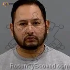 Mugshot of Rene Alejandro Flores Barrales booked in Maricopa County, Arizona on October 24, 2026