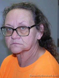 Mugshot of RHONDA JANE THOMPSON booked in Adams County, Iowa on April 15, 2026