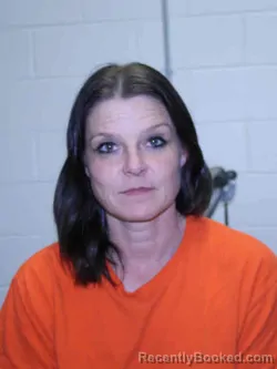 Mugshot of JENNIFER LYNN WILCOX booked in Adams County, Iowa on April 17, 2026