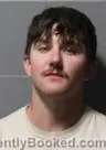 Mugshot of Brennon Michael Stanfel booked in Clinton County, Iowa on October 3, 2026
