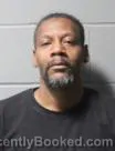 Mugshot of CHARLES MAURICE BURROWS booked in Clinton County, Iowa on May 13, 2026