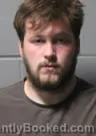 Mugshot of CALEB ALLEN DAVIS booked in Clinton County, Iowa on May 7, 2026