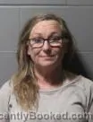 Mugshot of CHRISTA JOLENE GOULDEN booked in Clinton County, Iowa on April 18, 2026