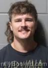 Mugshot of Carson Lowell Holland booked in Clinton County, Iowa on September 6, 2026