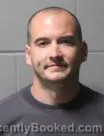Mugshot of DEVAN ALAN EBENSBERGER booked in Clinton County, Iowa on June 6, 2026