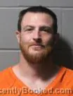 Mugshot of JUSTIN LEE BENNETT booked in Clinton County, Iowa on June 19, 2026