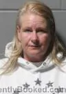 Mugshot of JULIE ANN ROTTMAN booked in Clinton County, Iowa on May 9, 2026