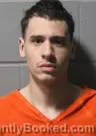 Mugshot of JORDAN EVAN SPROTT booked in Clinton County, Iowa on May 7, 2026