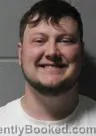 Mugshot of JAKOB CHRISTIAN SCHMIDT booked in Clinton County, Iowa on May 10, 2026