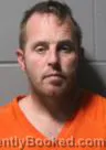Mugshot of JUSTIN JOHN SLIGHTOM booked in Clinton County, Iowa on May 7, 2026