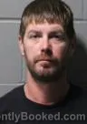 Mugshot of Logan Alan John Manikowski booked in Clinton County, Iowa on October 5, 2026