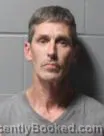 Mugshot of TODD ALAN HOWARD booked in Clinton County, Iowa on July 30, 2026