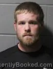 Mugshot of TYLER JAMES TAPLIN booked in Clinton County, Iowa on June 18, 2026