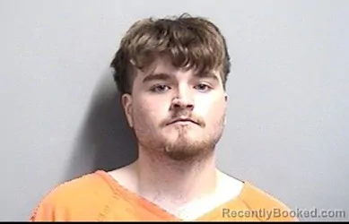 Mugshot of ISAAC DALE EVANS booked in Dallas County, Iowa on March 8, 2026