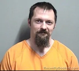 Mugshot of JUSTIN LEE DAHM booked in Dallas County, Iowa on March 10, 2026