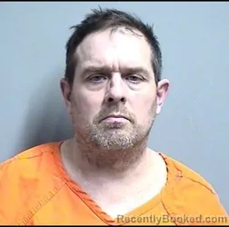 Mugshot of JASON DALE CHARLET booked in Dallas County, Iowa on March 11, 2026