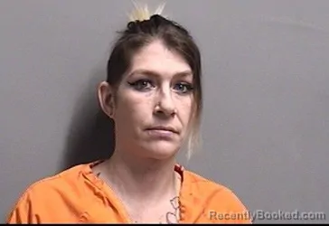 Mugshot of NICOLE LYNNE SMITH booked in Dallas County, Iowa on March 13, 2026