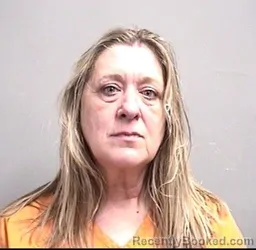 Mugshot of APRIL SUE BEECHUM booked in Dallas County, Iowa on March 22, 2026