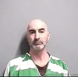 Mugshot of RANDY LEE COMSTOCK booked in Dallas County, Iowa on March 25, 2026