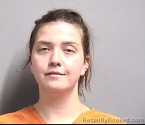 Mugshot of MERRIDETH HOPE OLSON booked in Dallas County, Iowa on April 3, 2026