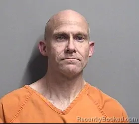 Mugshot of RICHARD DEWEY POST booked in Dallas County, Iowa on April 8, 2026