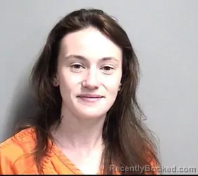 Mugshot of CHARITY MARIE BATMAN OLWELL booked in Dallas County, Iowa on April 16, 2026