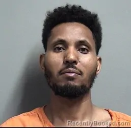 Mugshot of ANGESOM YIRGALEM ADHANOM booked in Dallas County, Iowa on April 17, 2026