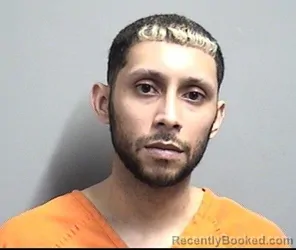 Mugshot of MICHAEL COLON RAMOS booked in Dallas County, Iowa on April 21, 2026