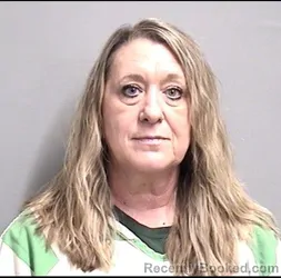 Mugshot of APRIL SUE BEECHUM booked in Dallas County, Iowa on April 23, 2026